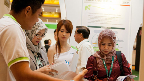 Visitors learning more about Hitachi water treatment solutions